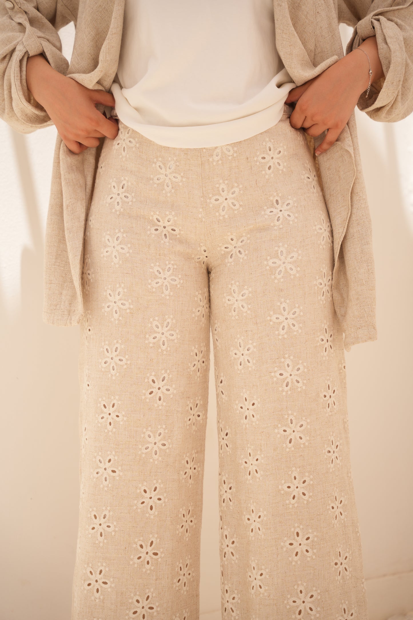 Linen suit with embroidered trousers