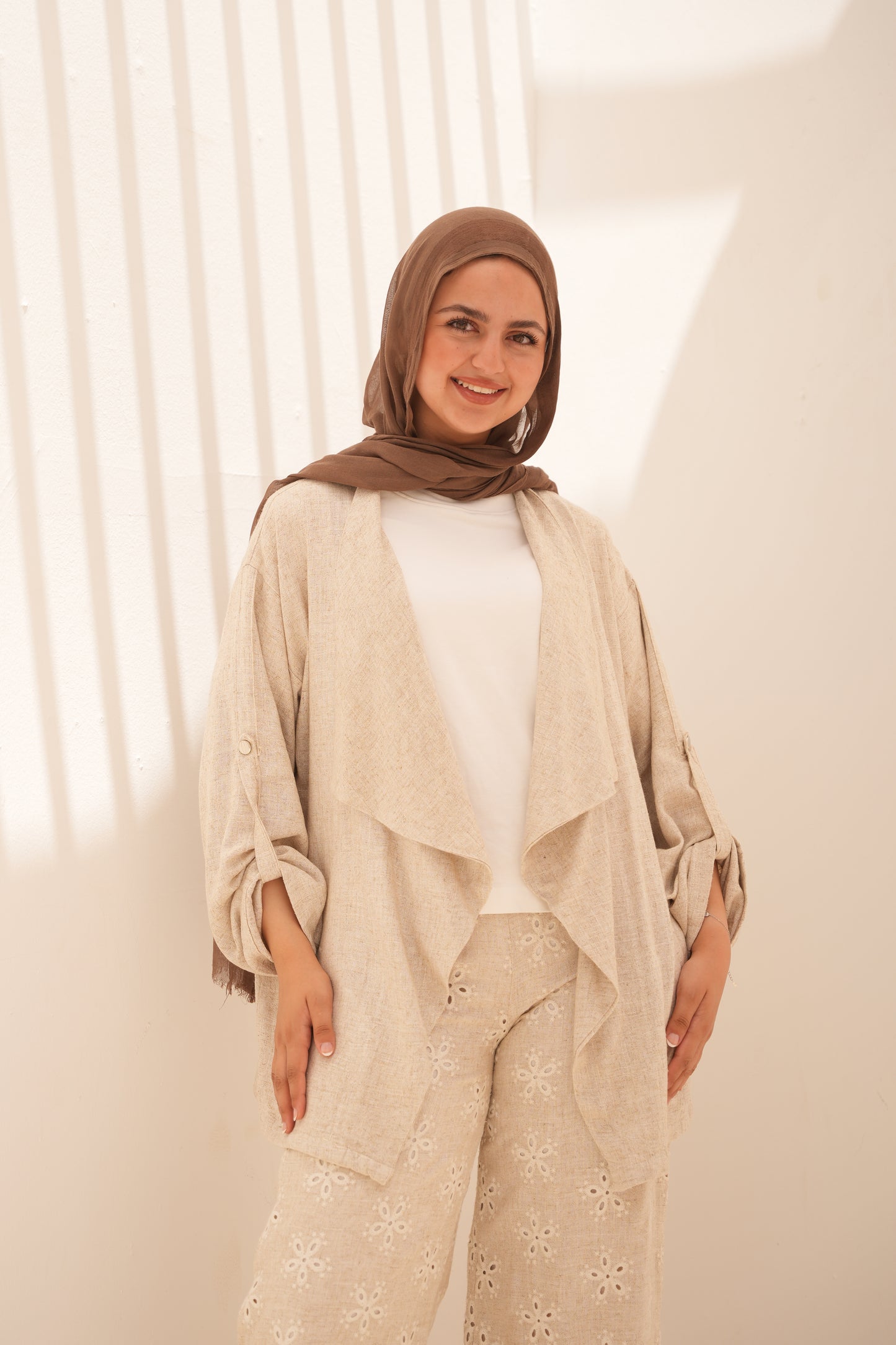 Linen suit with embroidered trousers