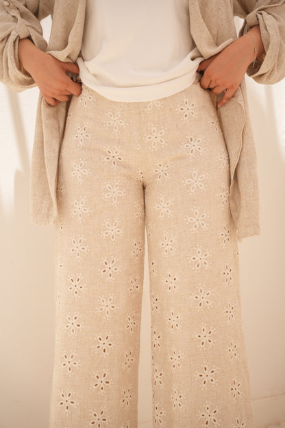 Linen suit with embroidered trousers